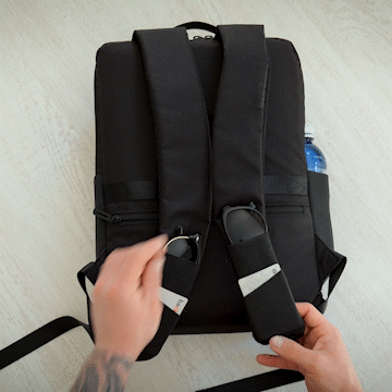 Elastic pockets on the shoulder straps of backpack
